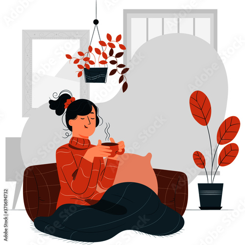 young lady sitting on the floor. Woman sitting on the floor with cushions drinking coffee. 