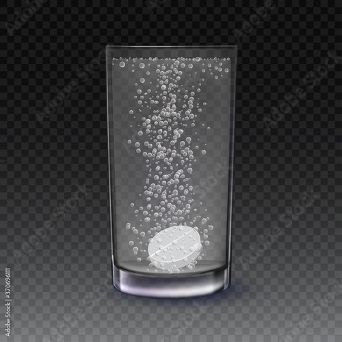Realistic effervescent tablet in glass of water. Realistic effervescent pill with bubbles dissolving in glass of water