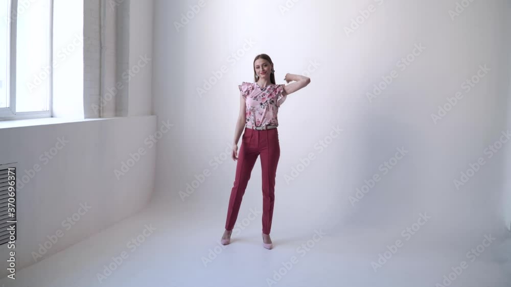 Sexy girl on a white background posing and smiling, glamorous girl, fashion model Sexy girl on a white background posing and smiling, glamorous girl, fashion model