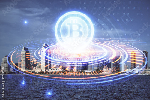 Double exposure of crypto currency theme hologram drawing and city veiw background. Concept of blockchain and bitcoin. © peshkova