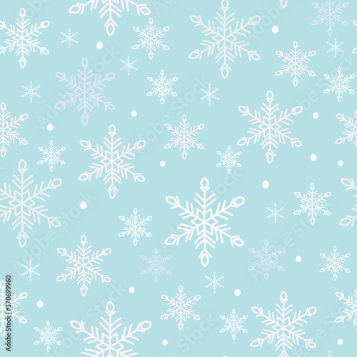 Snowflakes seamless pattern. White snow crystals on sky blue background. Great for winter fabric, textile, Christmas wrapping paper, scrapbooking. Surface pattern vector design.