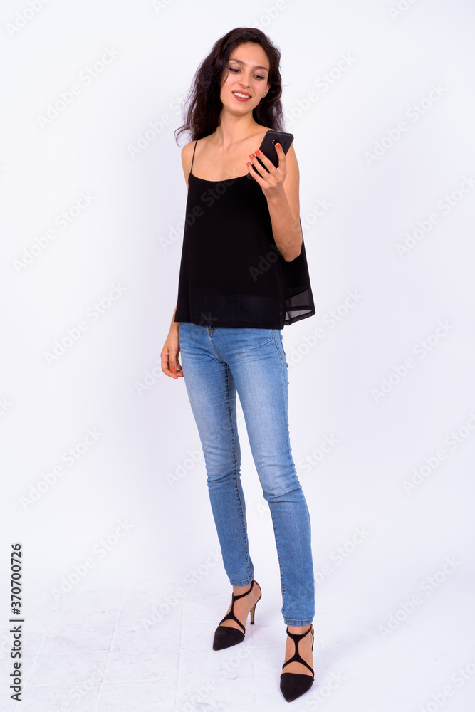 Portrait of happy young beautiful woman using phone Portrait of happy young beautiful woman using phone