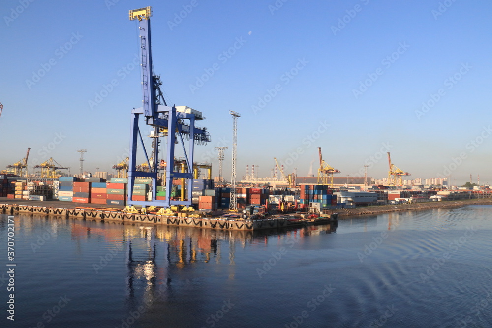 large crane in container port in st petersburg
