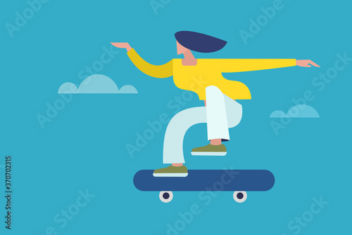Young modern girl skateboarding against a sky background