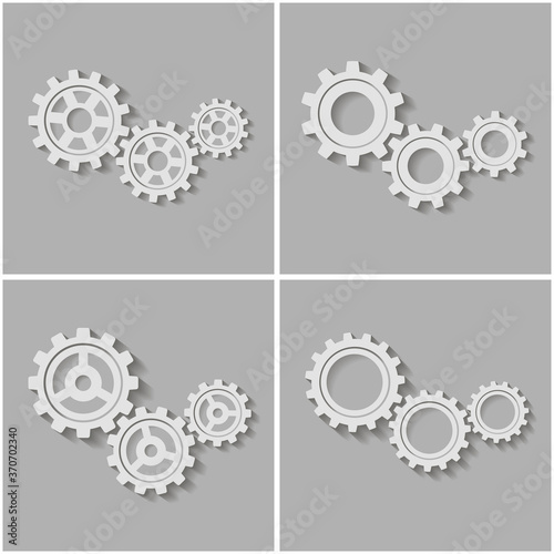 Set of mechanical gears with a shadow. Vector icon.