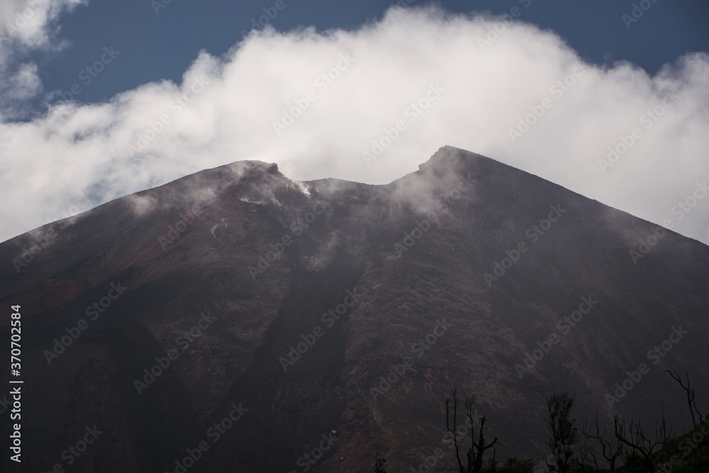 Detail view of the crater of the pacaya volcano among clouds
