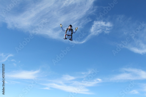 Skydiving. A military girl is flyingin the sky. © Sky Antonio