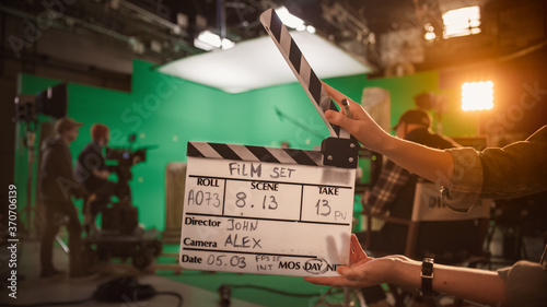 Slika na platnu On Film Studio Set Camera Assistant Holds Clapperboard
