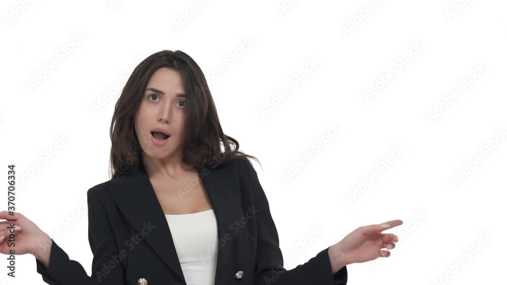 Portrait of young Caucasian woman in formal jacket making silly dance move. Snake dance. Funny business lady. Isolated on white background Portrait of young Caucasian woman in formal jacket making silly dance move. Snake dance. Funny business lady. Isolated on white background