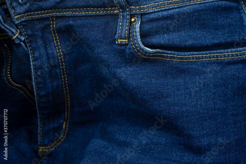 Cotton wear background, denim blue jeans backdrop