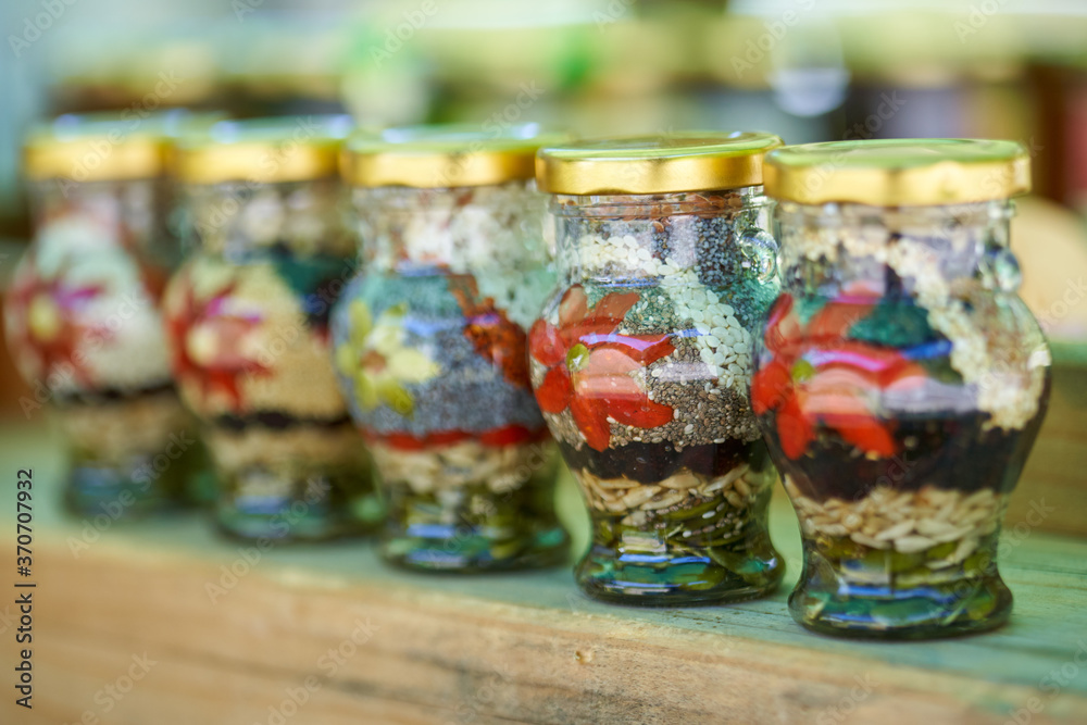 Decorative jars with flower motives