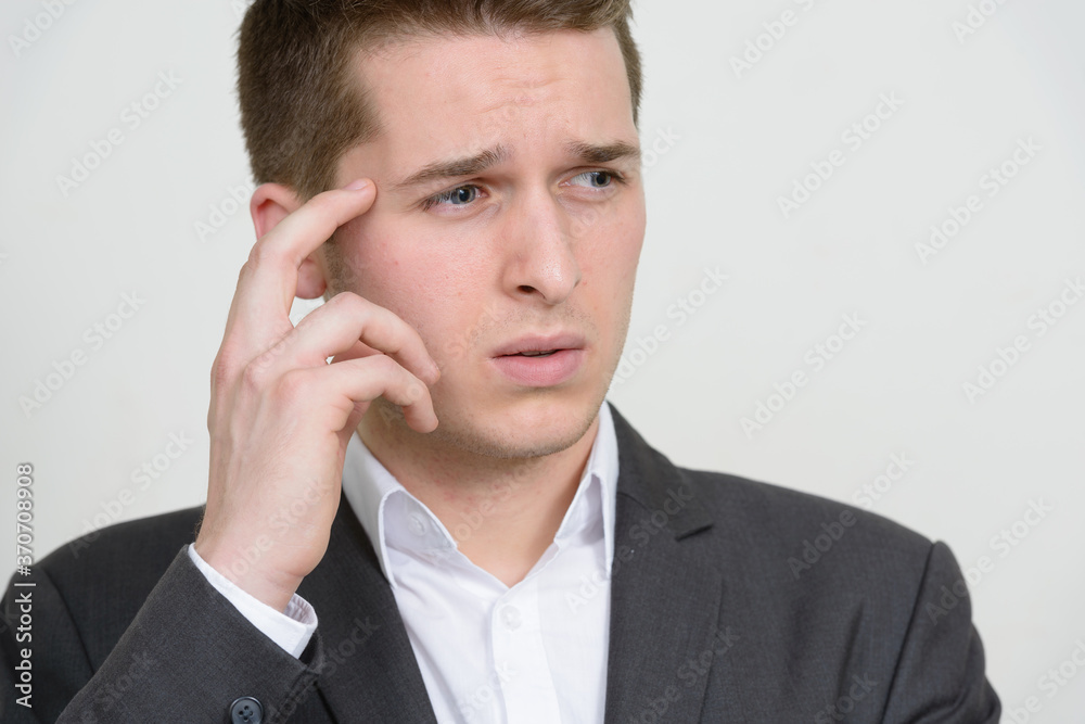 Portrait of young handsome businessman in suit Portrait of young handsome businessman in suit