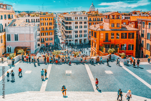 ROME, ITALY- MAY 08, 2017: Beautiful landscape historical view of the Rome, street, people, tourists on it. Spanish Sqare (Piazza di Spagna) and descent from the Spanish Stairs. Italy.