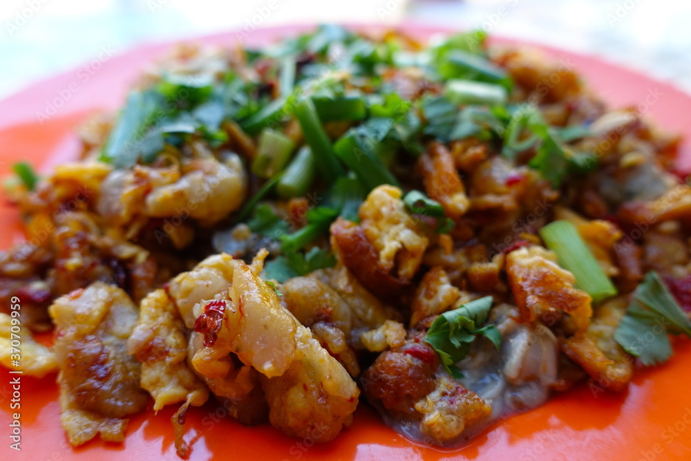 Oyster Omelete is a popular Asian street food. Oyster Omelete is a popular Asian street food.