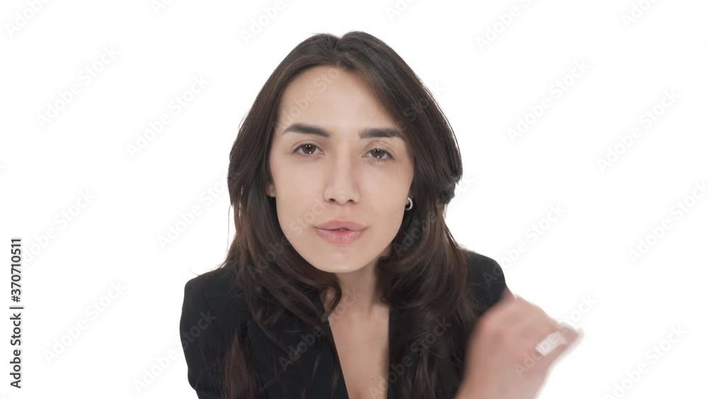 Top view of young attractive Caucasian woman sending blown kiss at camera and winking. Isolated on white background Top view of young attractive Caucasian woman sending blown kiss at camera and winking. Isolated on white background