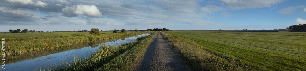 Canal near Havelte Drenthe Netherlands. Oude vaart. Evening light. River. Panorama.