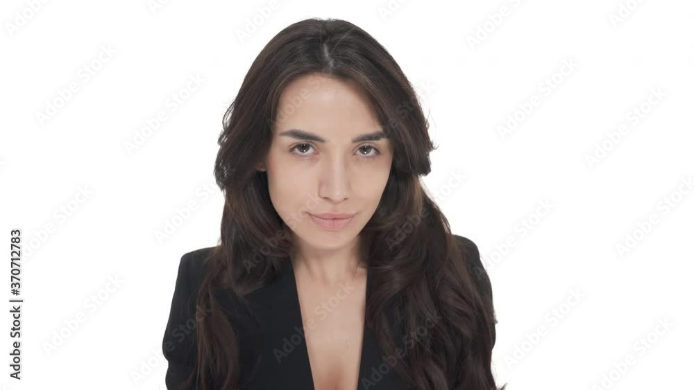 Top view of beautiful Caucasian woman showing shhh gesture and winking. Isolated on white background Top view of beautiful Caucasian woman showing shhh gesture and winking. Isolated on white background