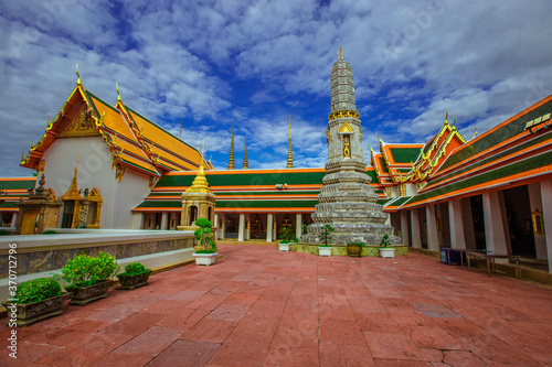 background of important religious attractions in Bangkok  Wat Phra Chetuphon  Wat Pho - reclining Buddha   a large pagoda and beautiful sculptural art give future generations to explore its history