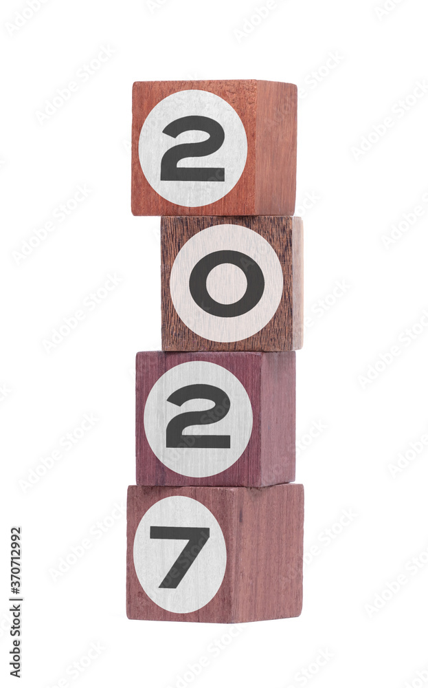 Four isolated hardwood toy blocks, saying 2027 Four isolated hardwood toy blocks, saying 2027