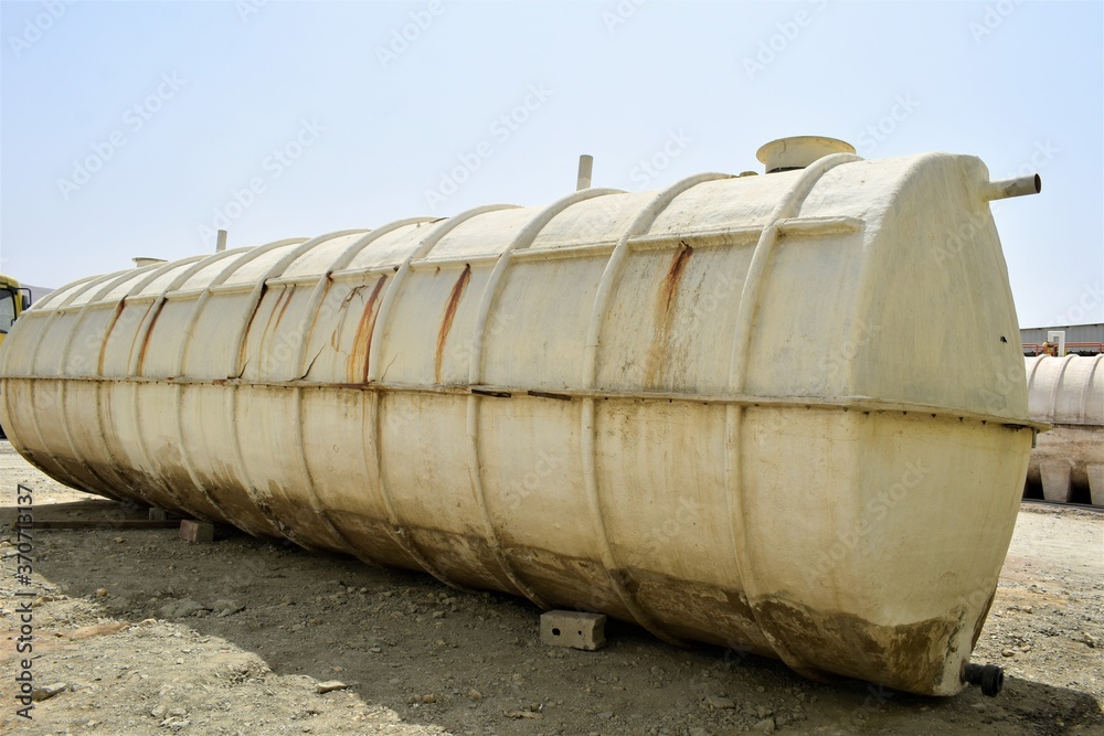 big white water tank in the construction site big white water tank in the construction site