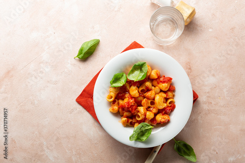 Vegan pasta with tomato sauce top view