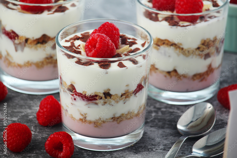 Granola with yogurt trifles with raspberry