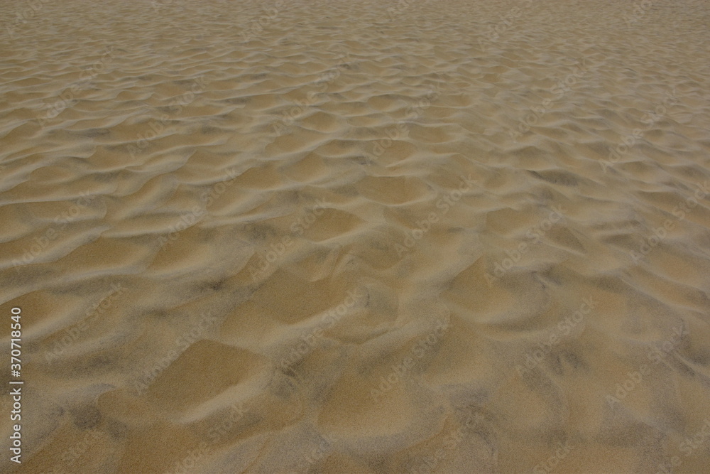 Muster im feinen weißen Sand