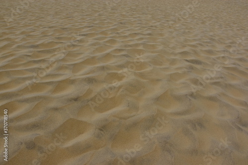 Muster im feinen wei  en Sand