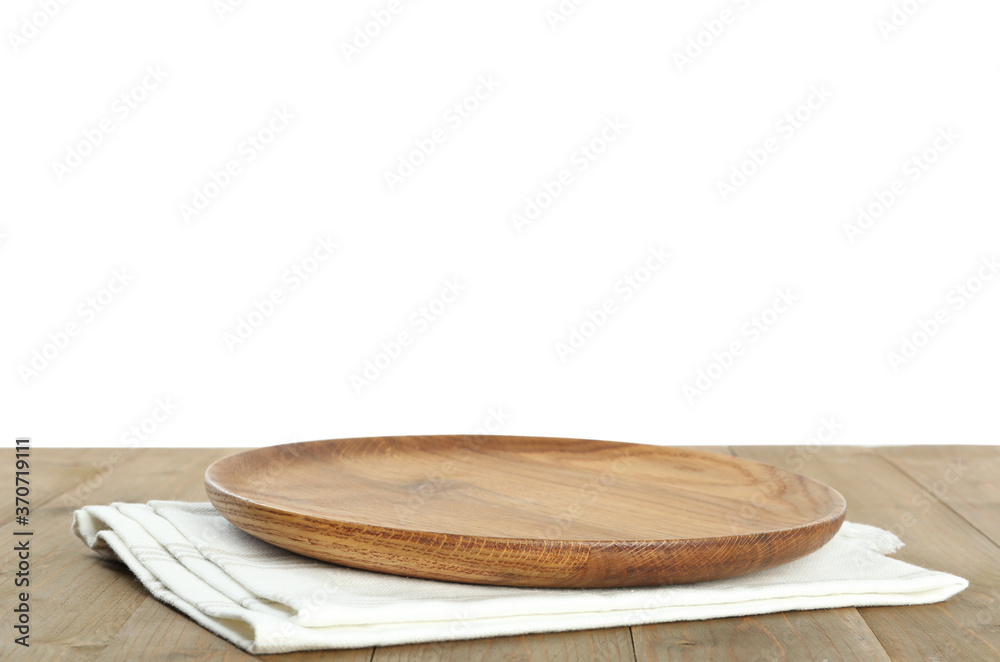 Empty plate and napkin on wooden table Empty plate and napkin on wooden table