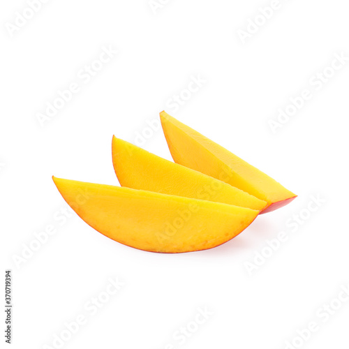 Slices of ripe mango isolated on white. Exotic fruit