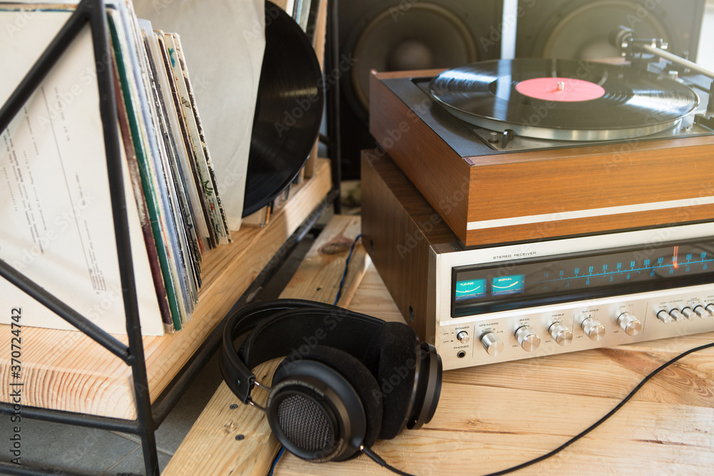 HiFi system with turntable, amplifier, headphones and lp vinyl records in a  listening room Stock-Foto | Adobe Stock