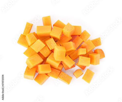 Cubes of fresh ripe carrot isolated on white, top view