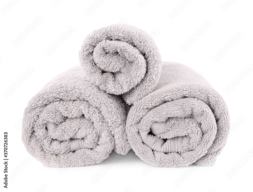 Rolled soft terry towels isolated on white