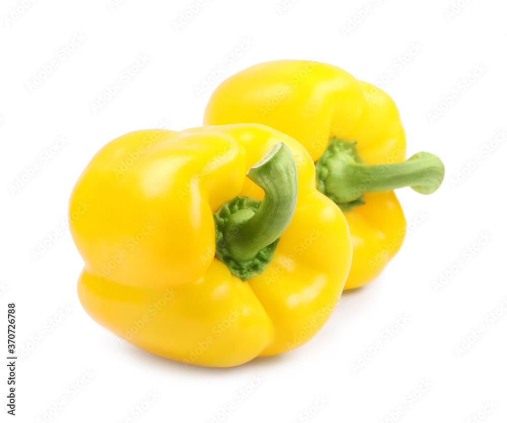 Ripe yellow bell peppers isolated on white Ripe yellow bell peppers isolated on white