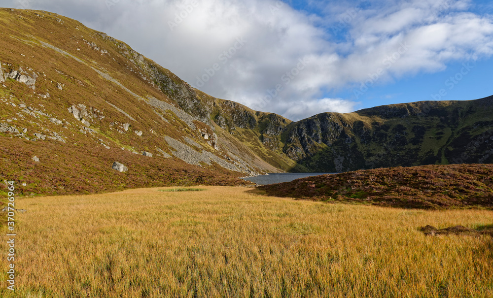 Loch Brandy above Glen Clova in the Angus Glens on an early morning in September, with the Reed Beds in the foreground.