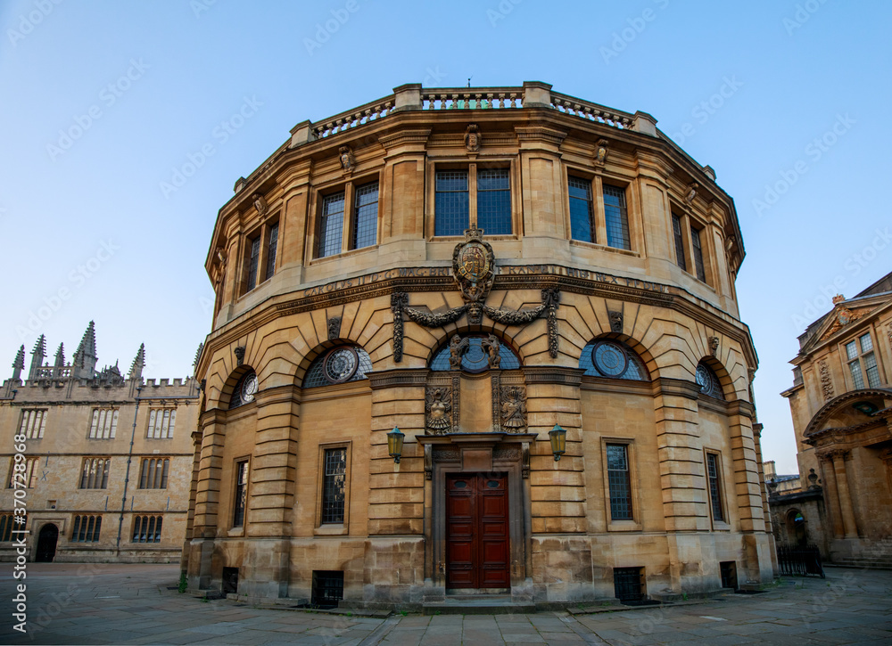 The Sheldonian Theatre from Broad Street in Oxford with no people. Early in the morning. Oxford, England, UK.