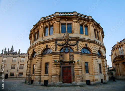 The Sheldonian Theatre from Broad Street in Oxford with no people. Early in the morning. Oxford, England, UK.