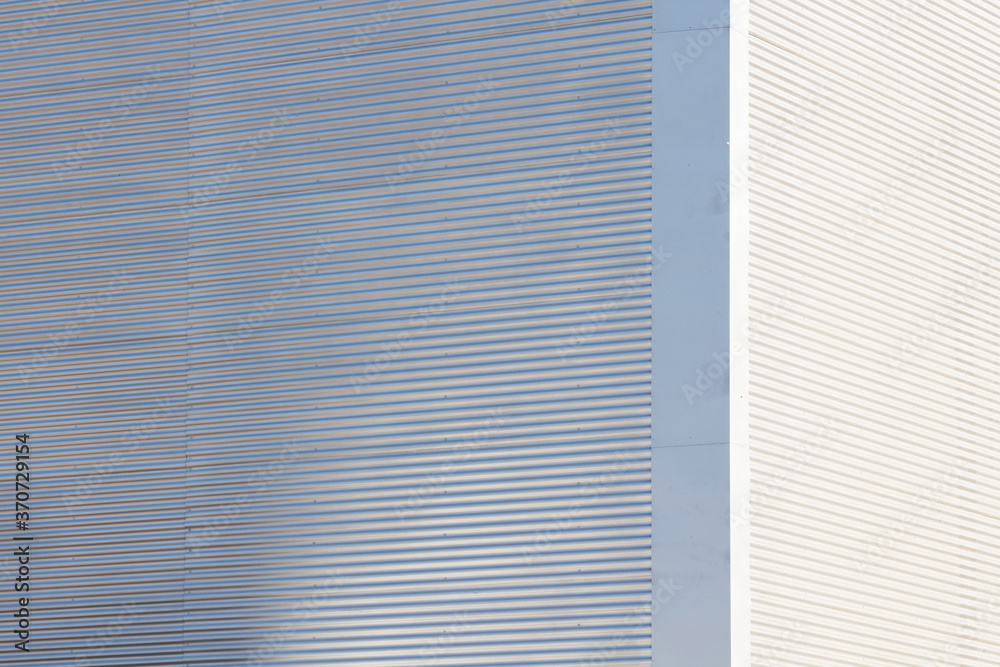 Urban architecture. Close of a metallic building facade Urban architecture. Close of a metallic building facade
