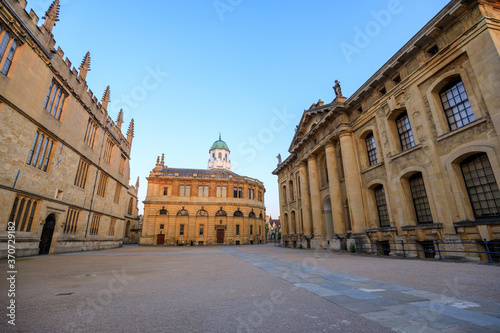The side of the Sheldonian Theatre and the Clarendon Building with no people around, early in the morning. Oxford, England, UK.