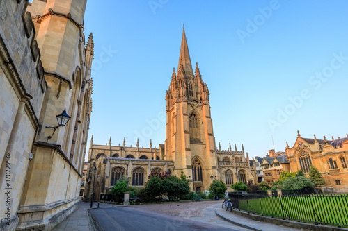 University Church of St Mary the Virgin in Oxford at sunrise with no people around, early in the morning on a clear day with blue sky. Oxford, England, UK. photo