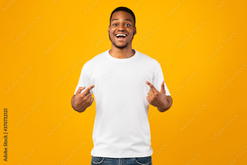 Handsome Black Guy Pointing At Himself Posing On Yellow Background Handsome Black Guy Pointing At Himself Posing On Yellow Background