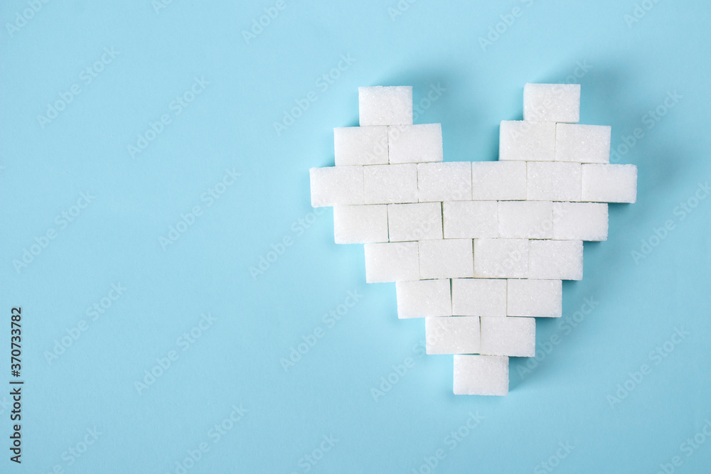 heart-made-from-sugar-cubes-sugar-harm-world-diabetes-day-concept