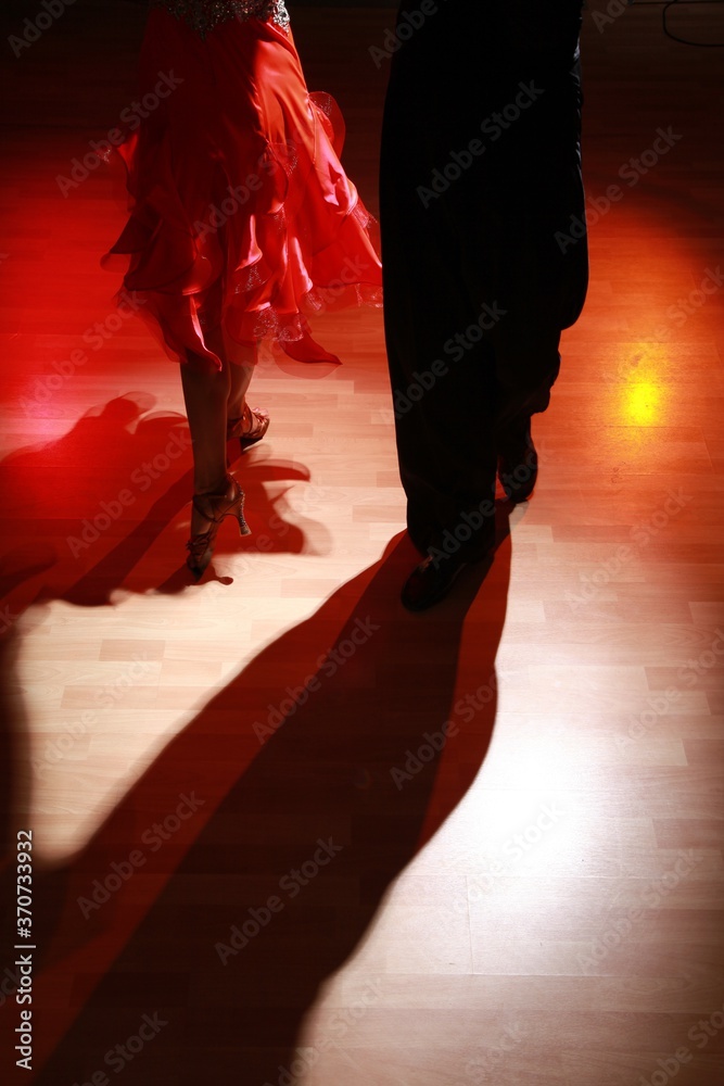 Fototapeta premium Legs of a Couple Dancing Tango