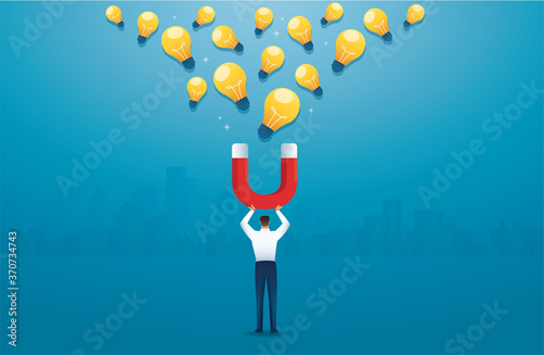 man holding magnet attracting light bulb creative concept. vector illustration
