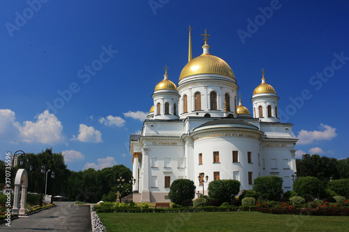 Stone old Orthodox Christian church with golden domes