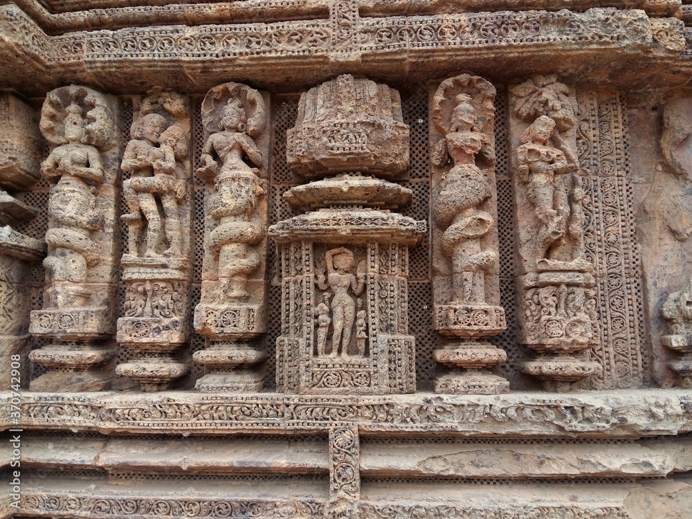 Sun Temple of Konark,India. Rock cut art on the walls. Ancient Hindu temple dedicated to the sun god.Sculptures of men and women in foreplay,dance and mythical charactures are portrayed.
