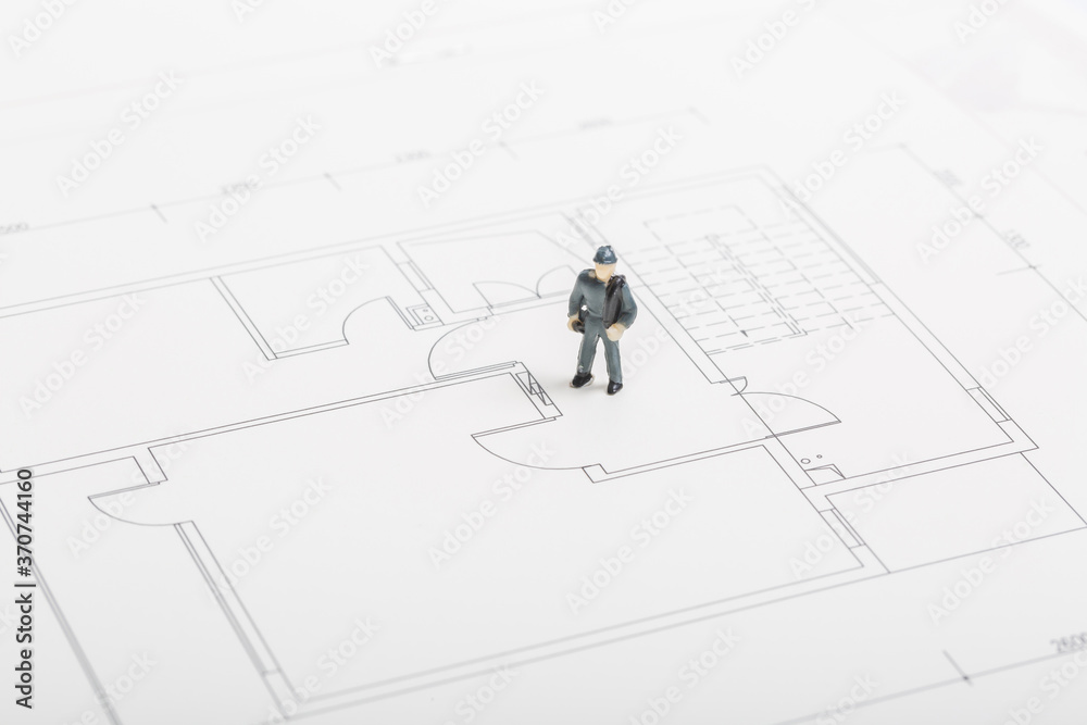 Building renovation drawings and miniature workers
Building renovation drawings and miniature workers