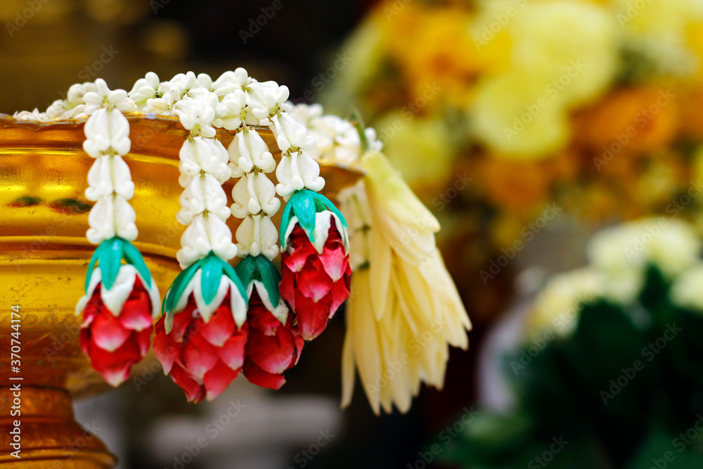close up of offering  in  buddhist temple in the city of bangkok -thailand 