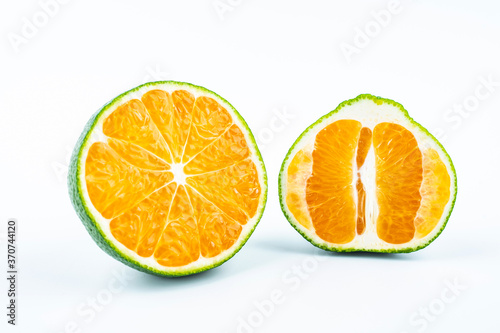 Fresh oranges on white background