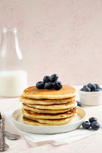 stack of pancakes with blueberries